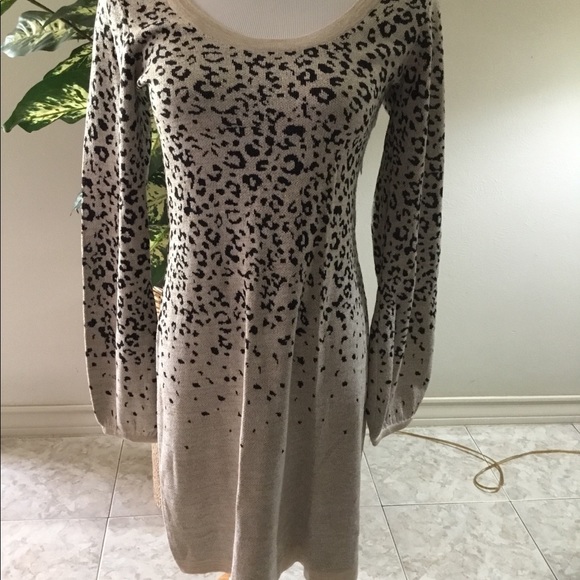 XOXO Dresses & Skirts - “XOXO” BLACK GOLD ANIMAL PRINT SWEATER DRESS